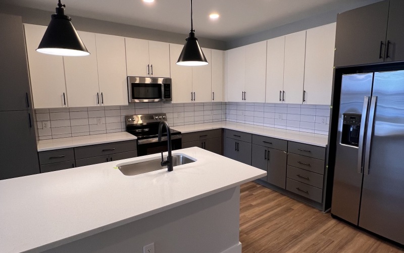 kitchen with white cabinets and stainless steel appliances